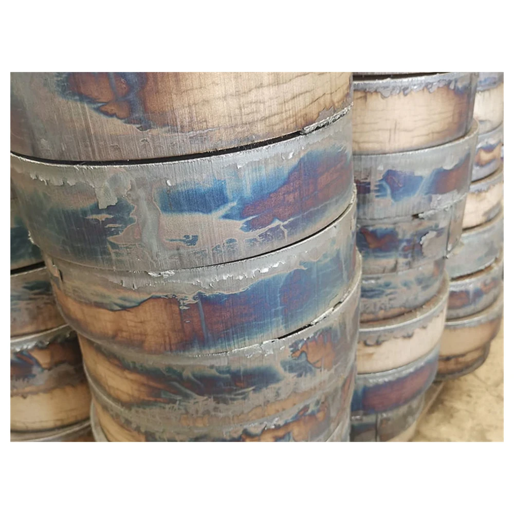 Flame-cut carbon steel plate parts stacked after cutting